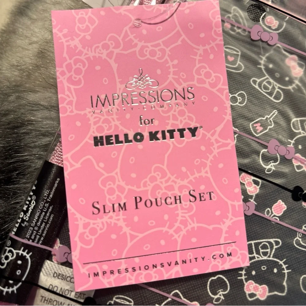 Impressions Hello Kitty Pink and Black Pouch
